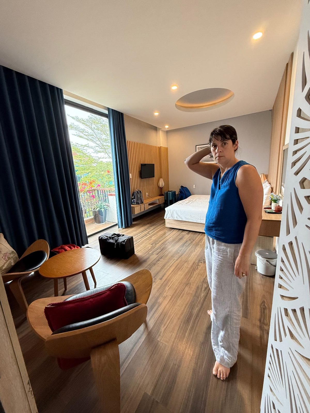 The Guava Lotus travel crib packed and folded in a hotel room