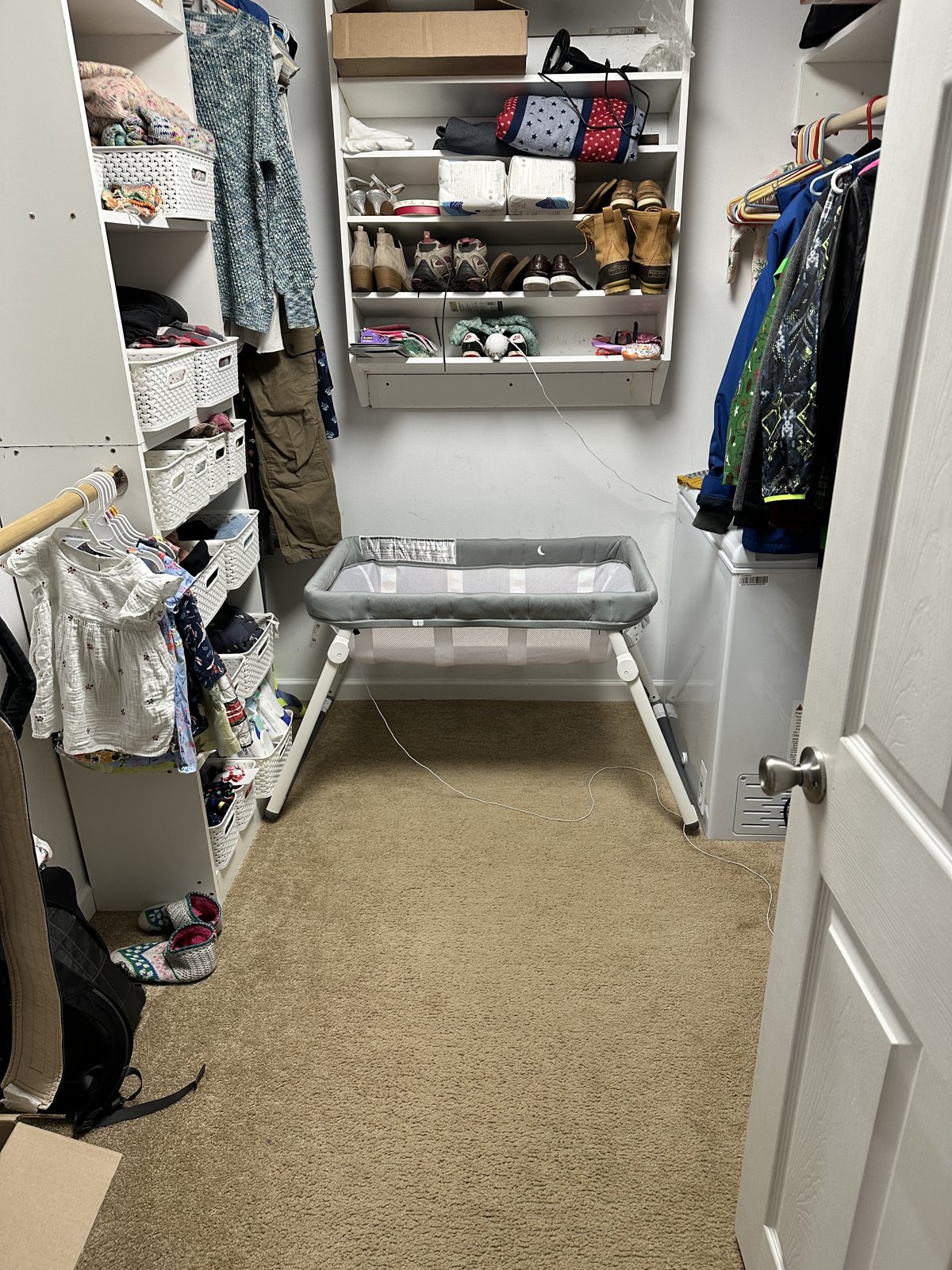 Guava Lotus bassinet set up in our bedroom closet